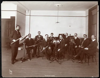 Men from the Barrere Ensemble Orchestra with Wind Instruments